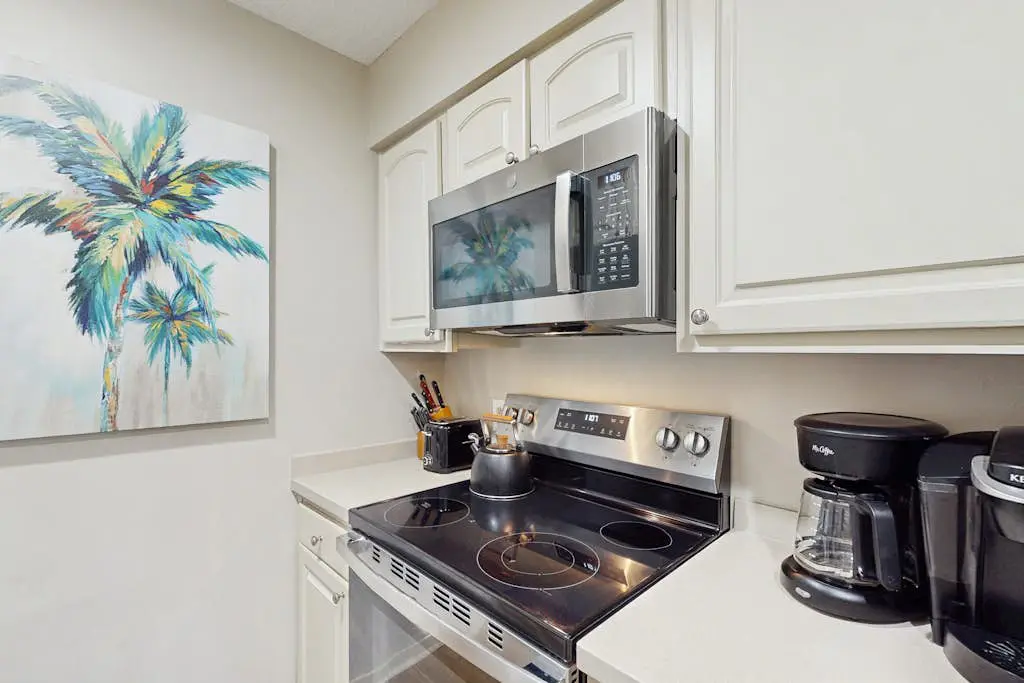 Villa with saltwater pool, golf, firepit, hot tub, & private beach access