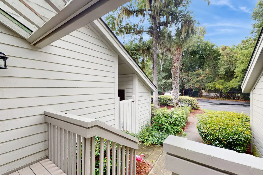 Villa with saltwater pool, golf, firepit, hot tub, & private beach access