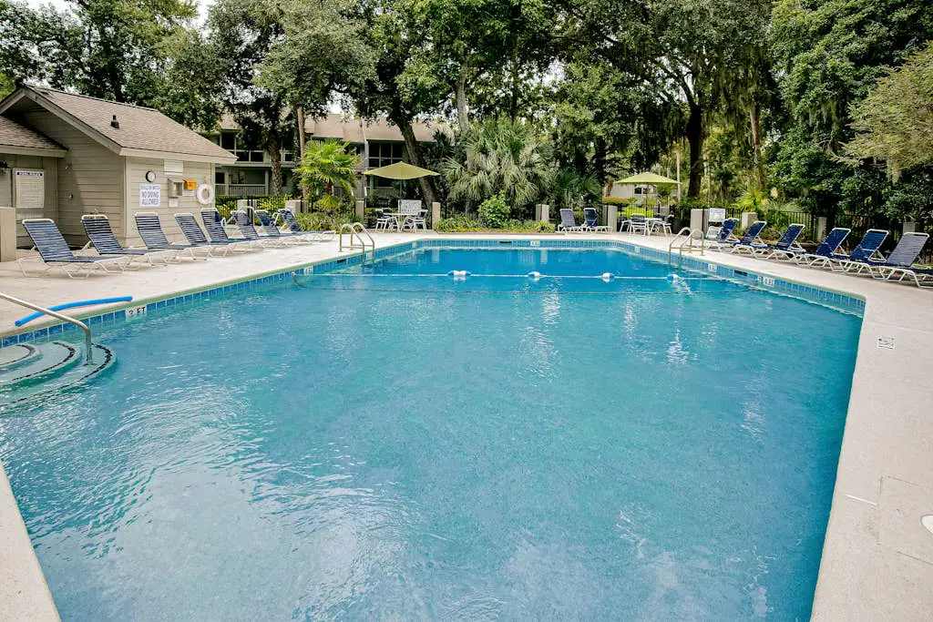 Villa with saltwater pool, golf, firepit, hot tub, & private beach access