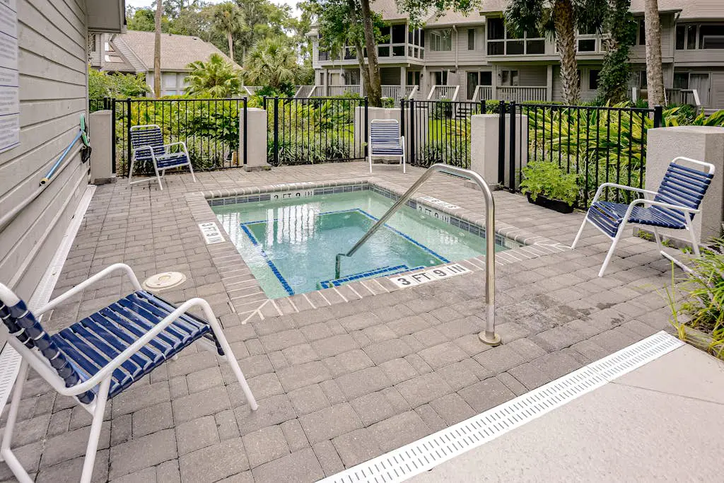Villa with saltwater pool, golf, firepit, hot tub, & private beach access
