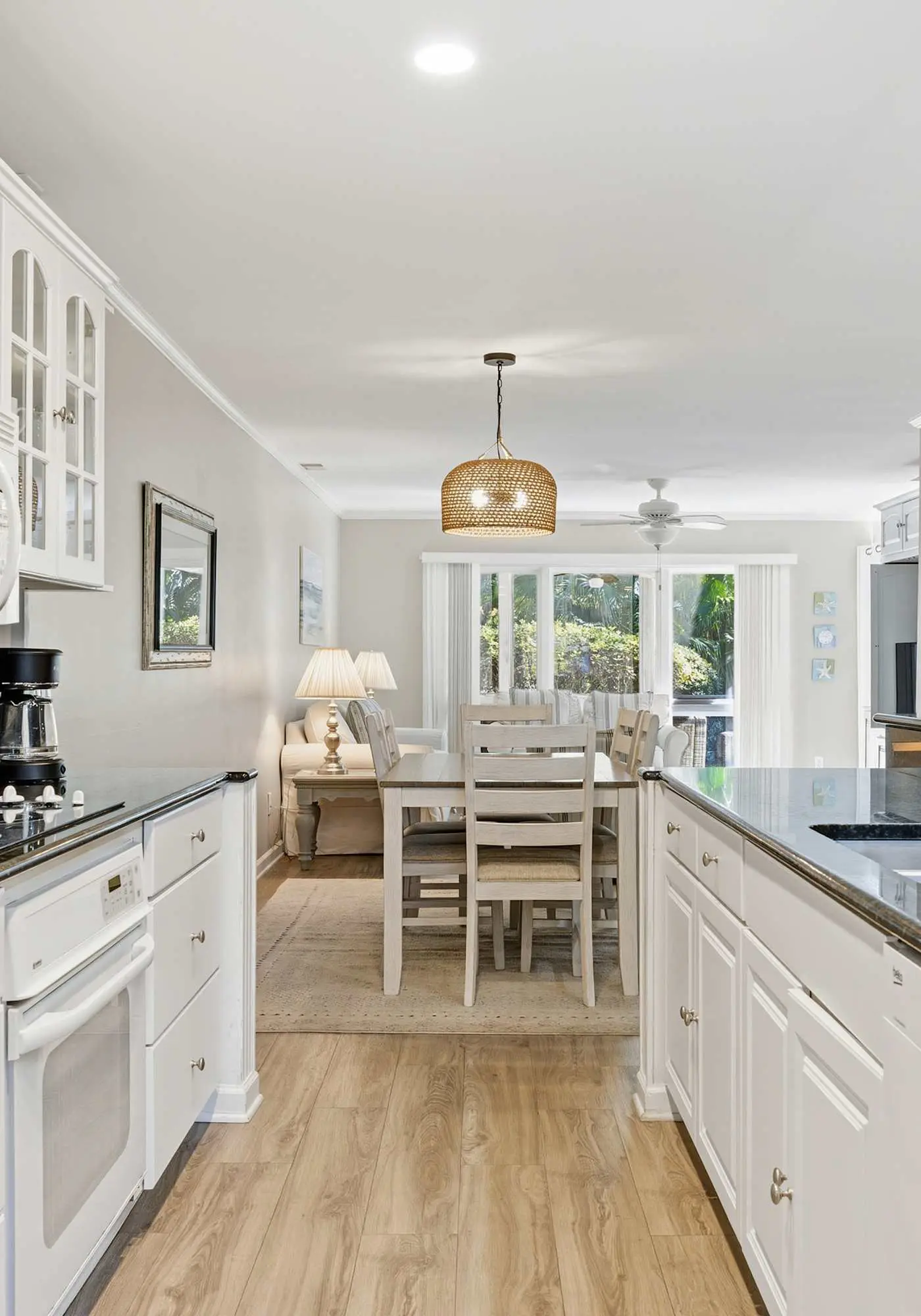 Updated all-suite tennis villa with W/D, pool, screened porch - near beach