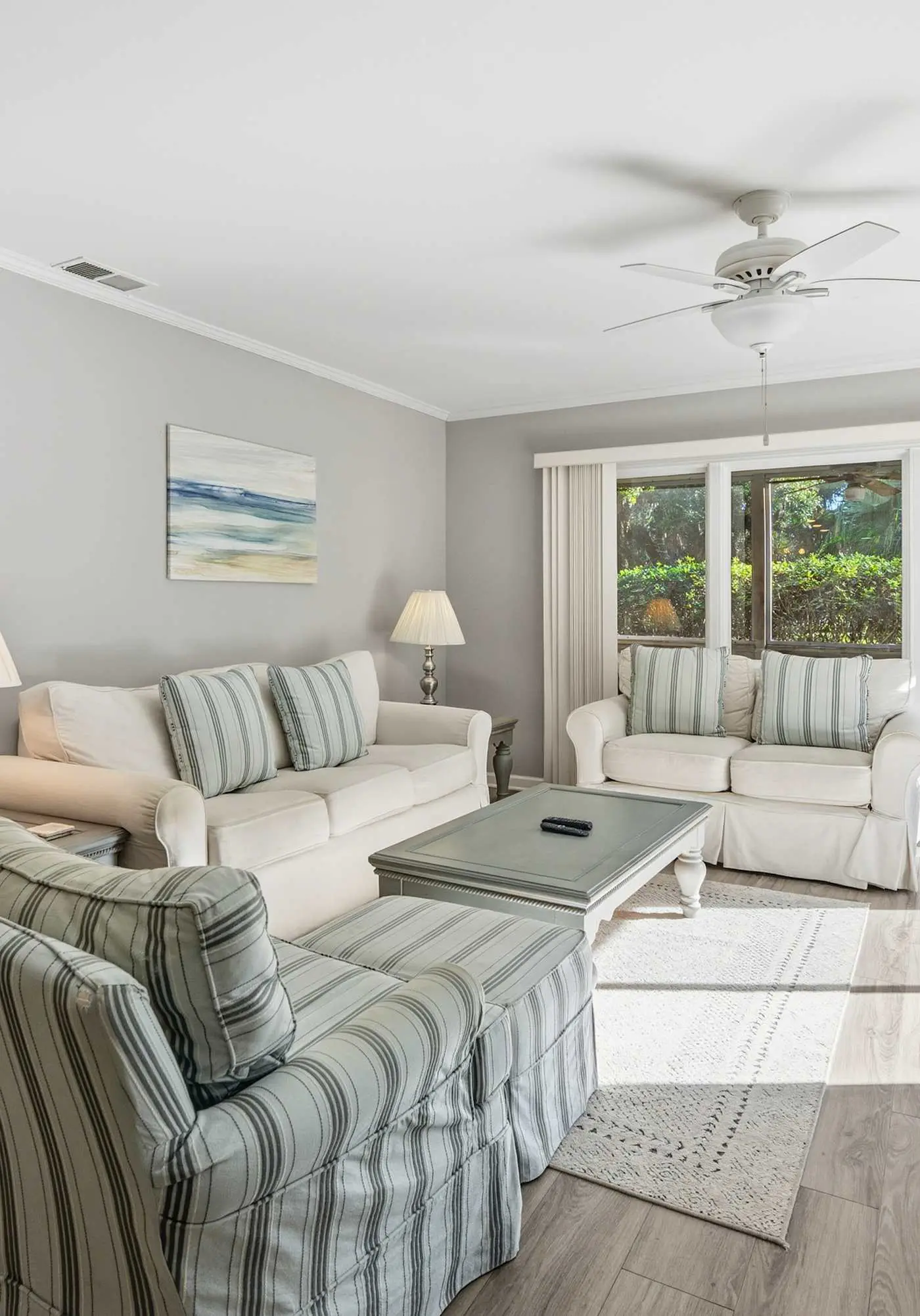 Updated all-suite tennis villa with W/D, pool, screened porch - near beach
