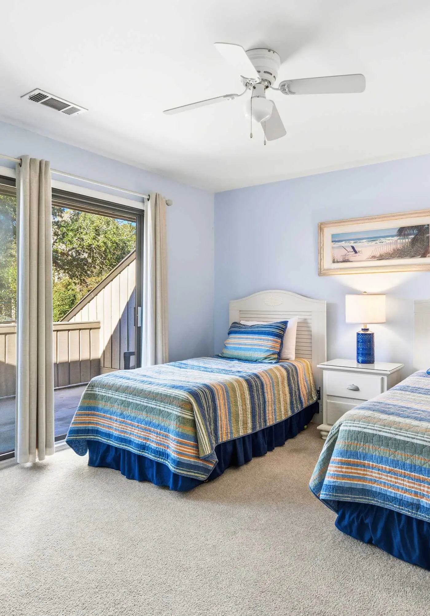 Updated all-suite tennis villa with W/D, pool, screened porch - near beach