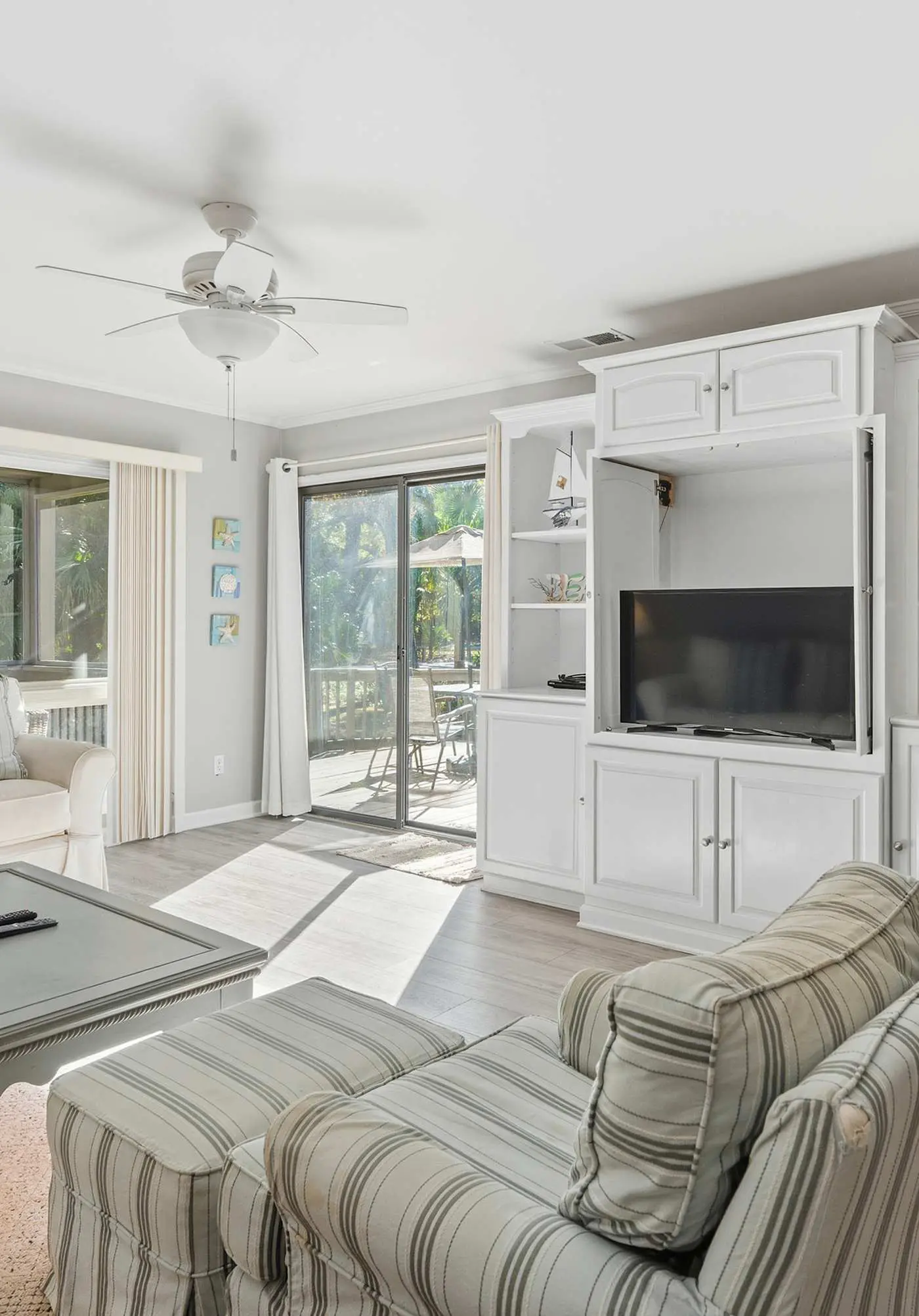 Updated all-suite tennis villa with W/D, pool, screened porch - near beach