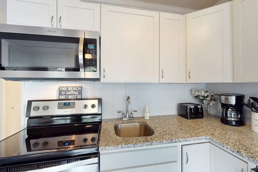 Updated Condo with Fast WiFi, Shared Pool, Balcony & Central AC - Walk to Beach