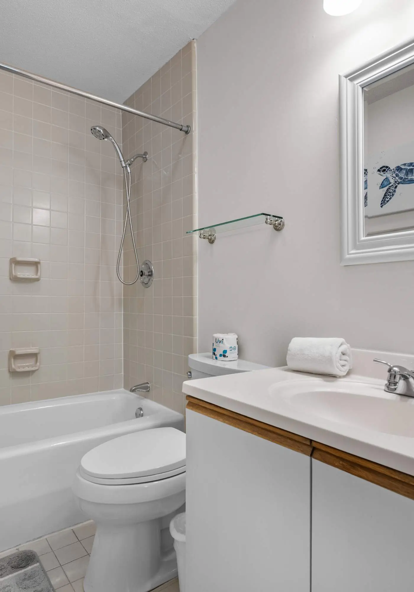 Lovely condo close to beach - pool access, elegant screened patio & washer/dryer