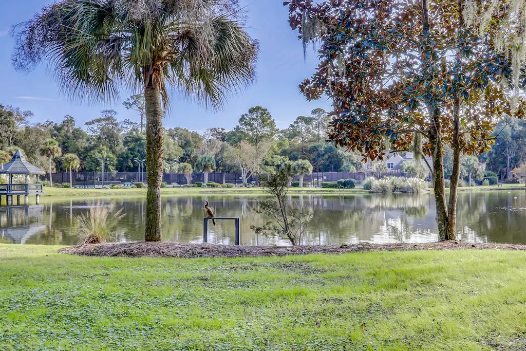 Dog-Friendly Condo w/ Lagoon & Golf View, WiFi & Shared Pool - Walk to Beach