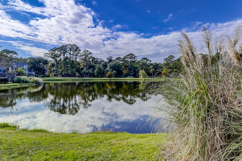 Dog-Friendly Condo w/ Lagoon & Golf View, WiFi & Shared Pool - Walk to Beach