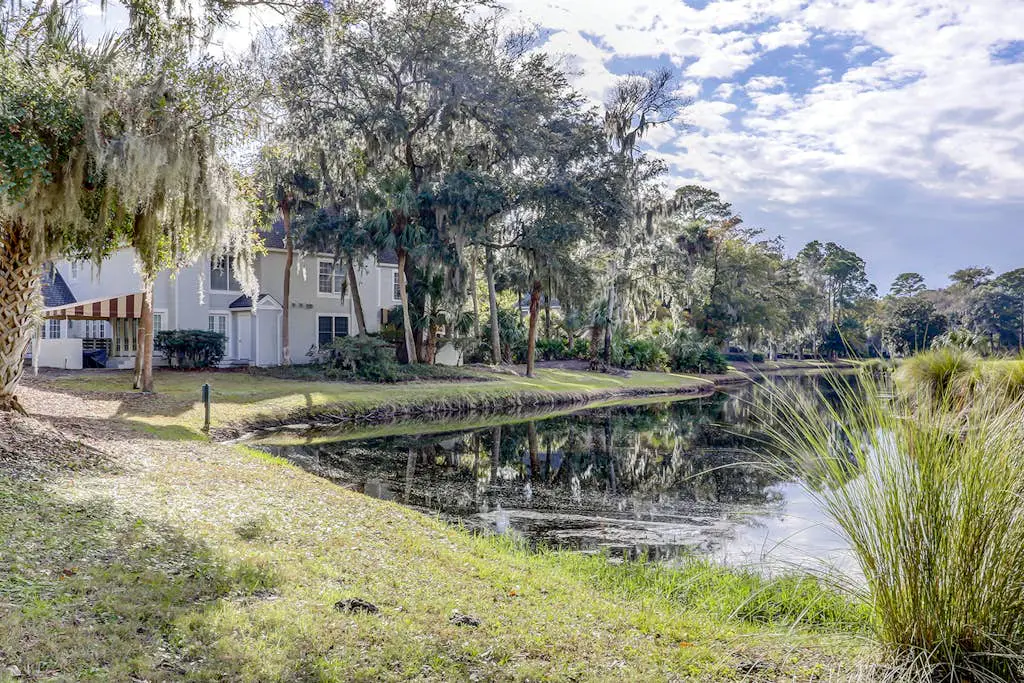 Dog-Friendly Condo w/ Lagoon & Golf View, WiFi & Shared Pool - Walk to Beach