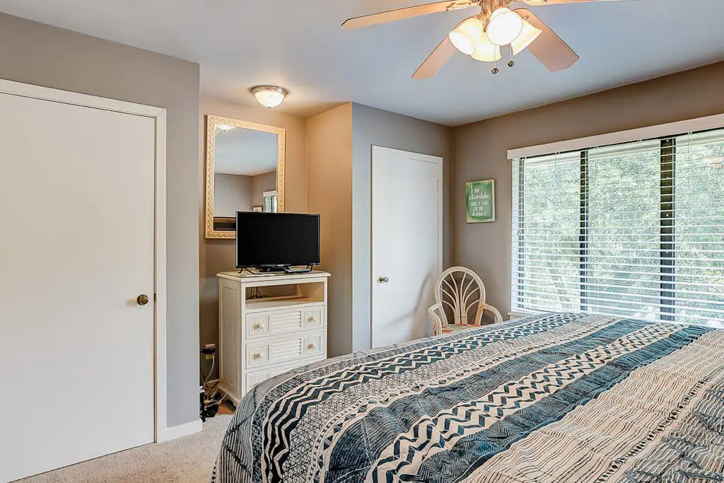 Two-story condo with pool - walk to Coligny Beach