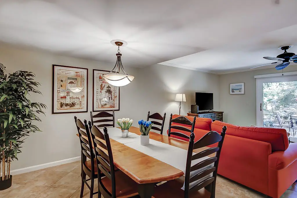Dog-Friendly Condo w/ Fast WiFi, a Patio, & Shared Pool - Walk to the Beach