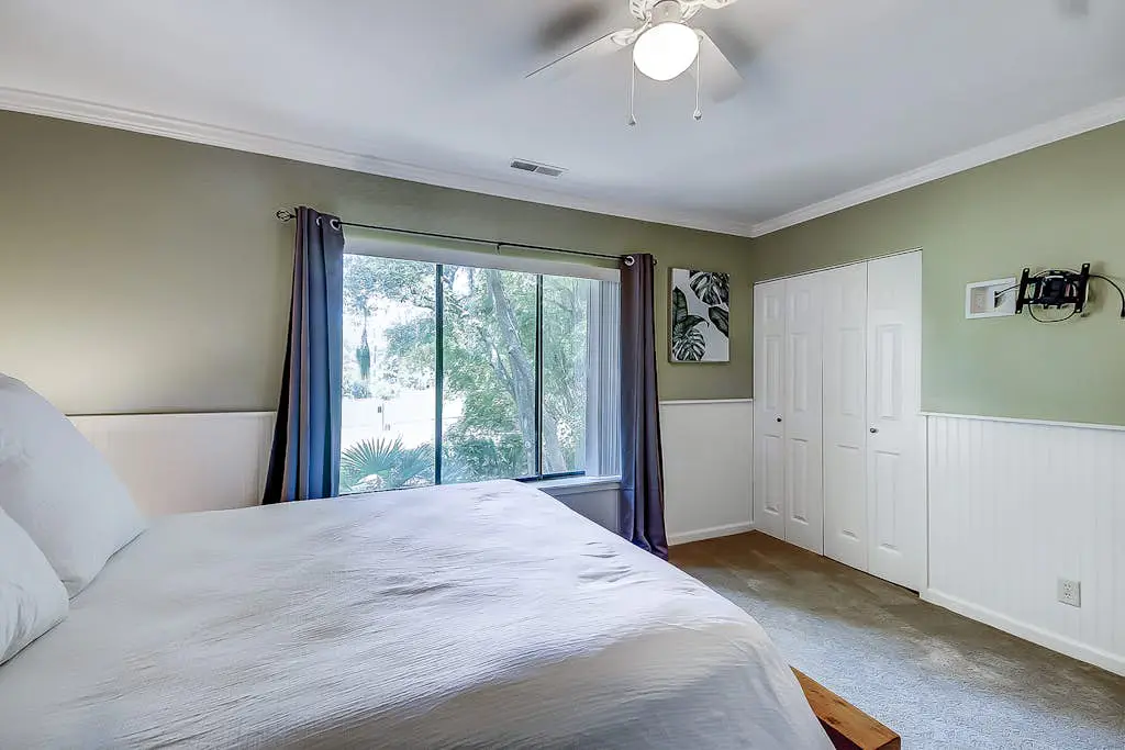 Dog-Friendly Condo w/ Fast WiFi, a Patio, & Shared Pool - Walk to the Beach