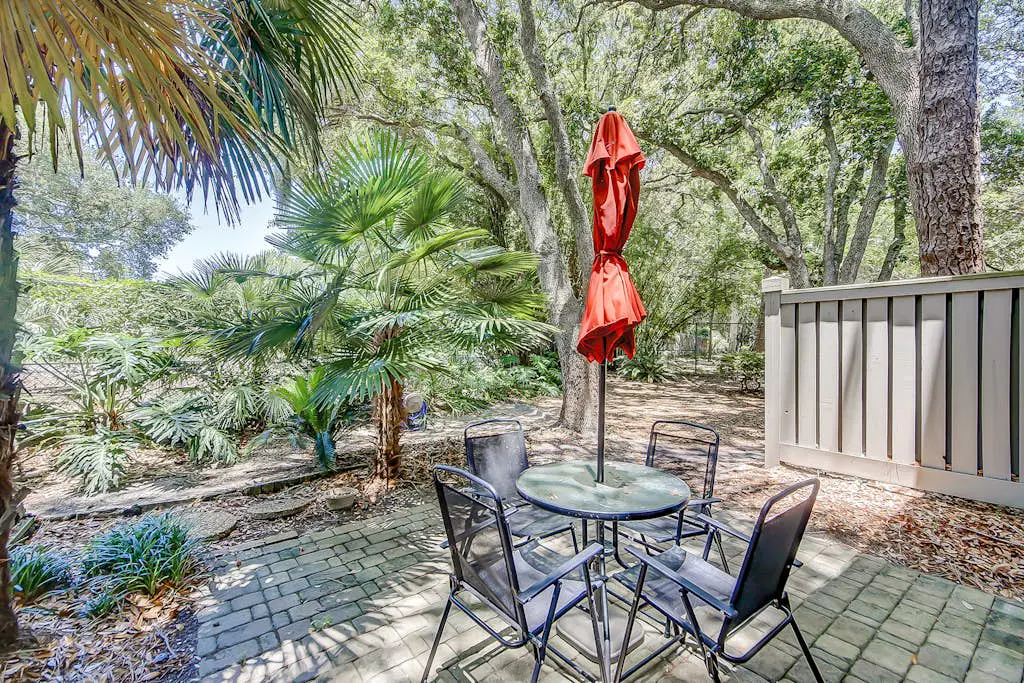 Dog-Friendly Condo w/ Fast WiFi, a Patio, & Shared Pool - Walk to the Beach