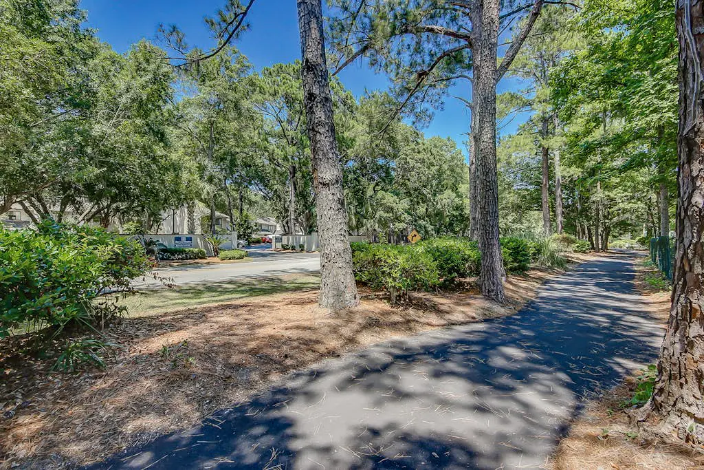 Dog-Friendly Condo w/ Fast WiFi, a Patio, & Shared Pool - Walk to the Beach