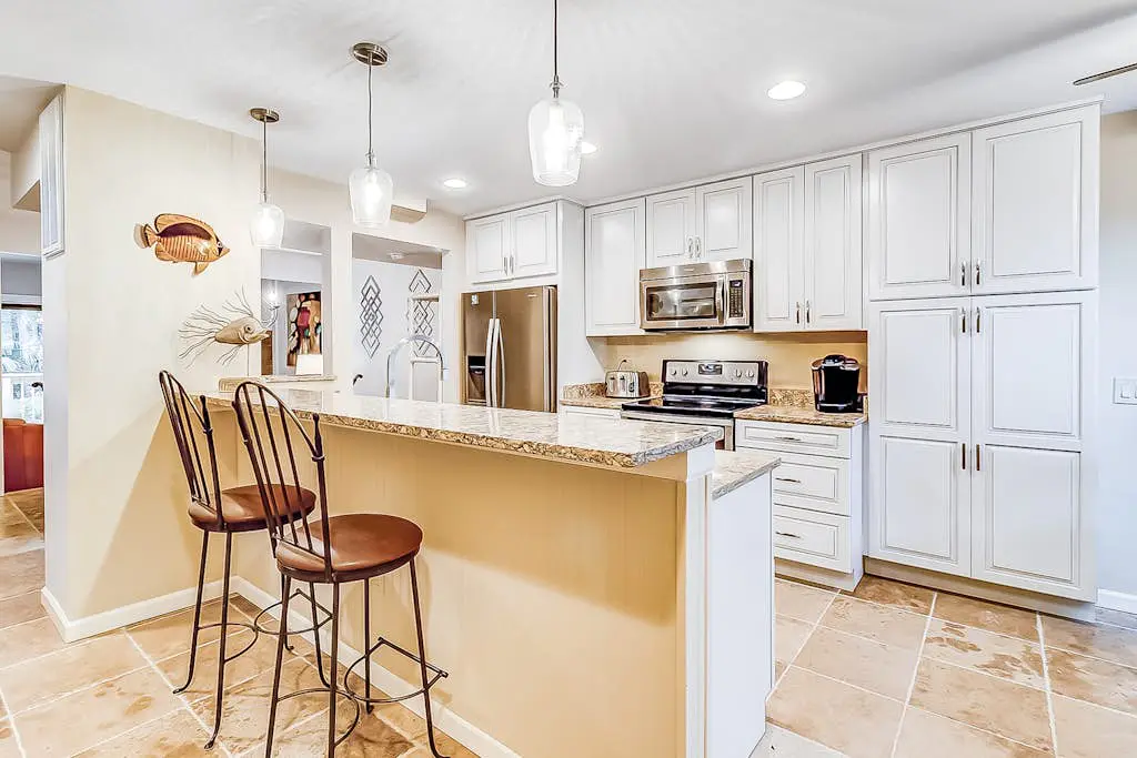 Dog-Friendly Villa w/ Walkable Beach Access, AC, Deck, WiFi & Shared Pool