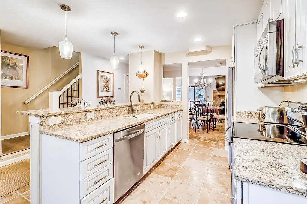 Dog-Friendly Villa w/ Walkable Beach Access, AC, Deck, WiFi & Shared Pool