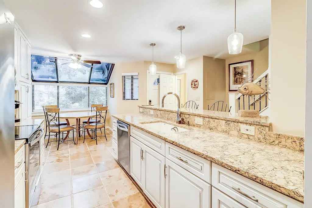 Dog-Friendly Villa w/ Walkable Beach Access, AC, Deck, WiFi & Shared Pool