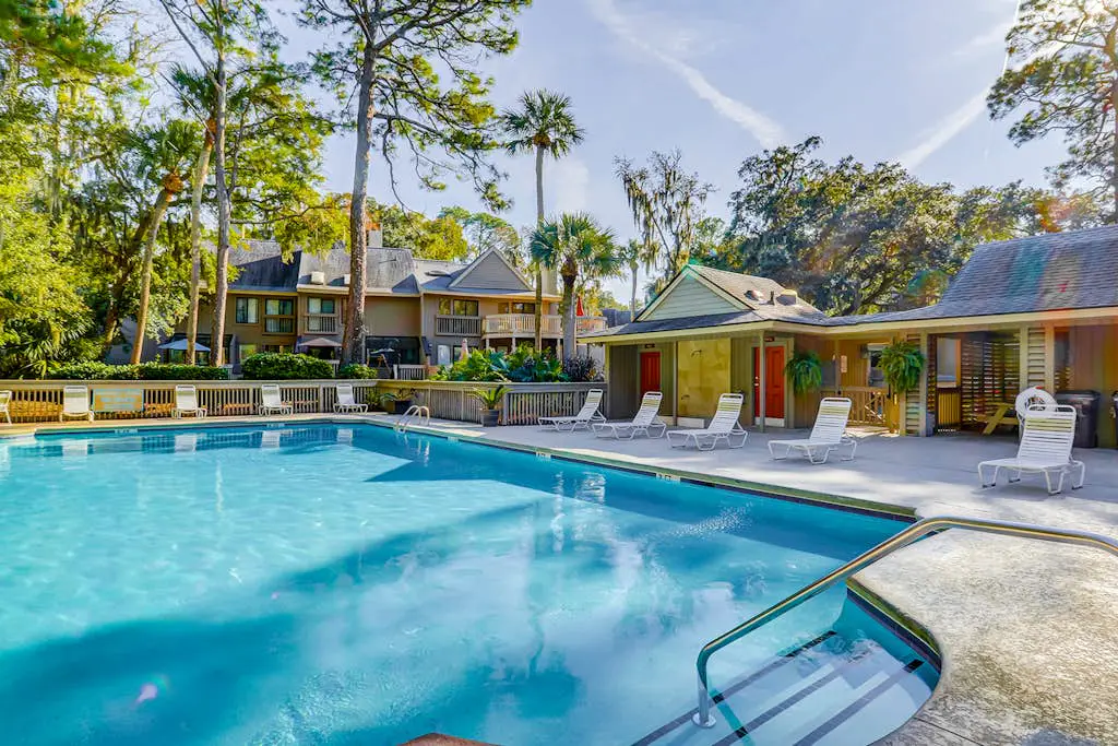 Dog-Friendly Villa w/ Walkable Beach Access, AC, Deck, WiFi & Shared Pool