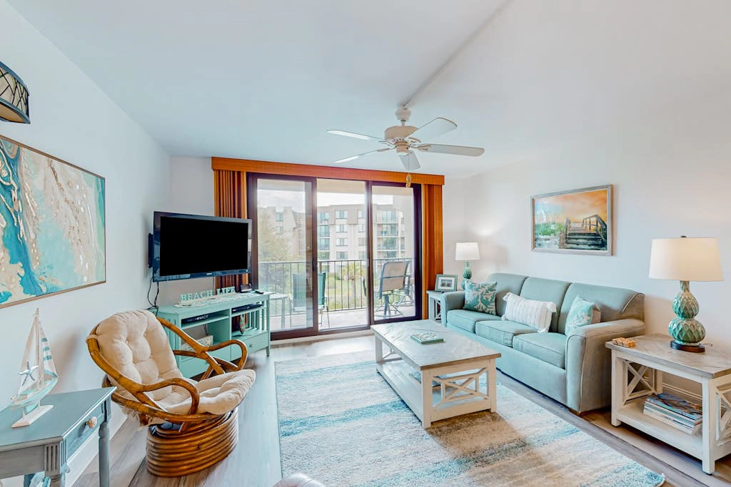 3rd-floor condo with balcony, lagoon views, pools, tennis courts, & beach access