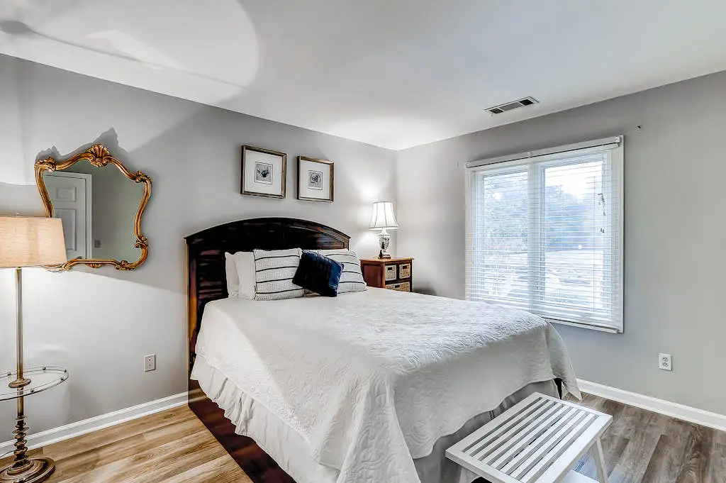 Sun-kissed bliss at Colonnade Club with dual suites, deck, shared pool, hot tub