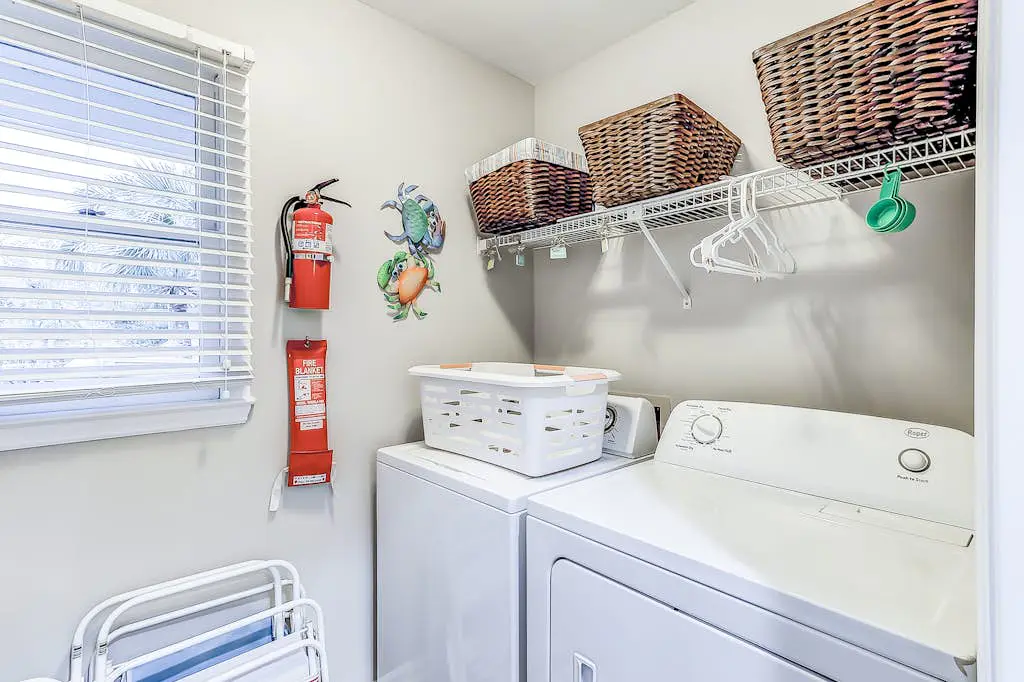Sun-kissed bliss at Colonnade Club with dual suites, deck, shared pool, hot tub
