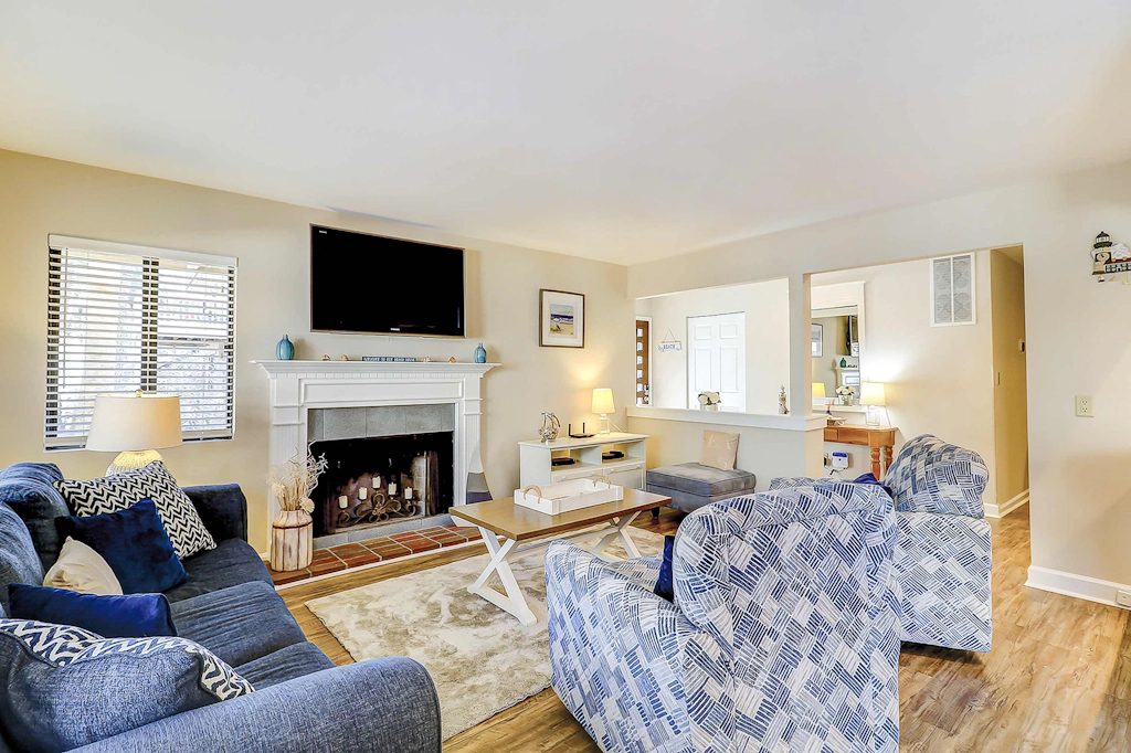 Relaxing First-Floor Condo | Walk to Beach | Spacious Deck + Remote Work Setup
