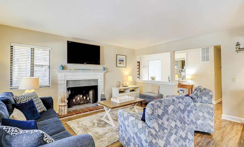 Relaxing First-Floor Condo | Walk to Beach | Spacious Deck + Remote Work Setup