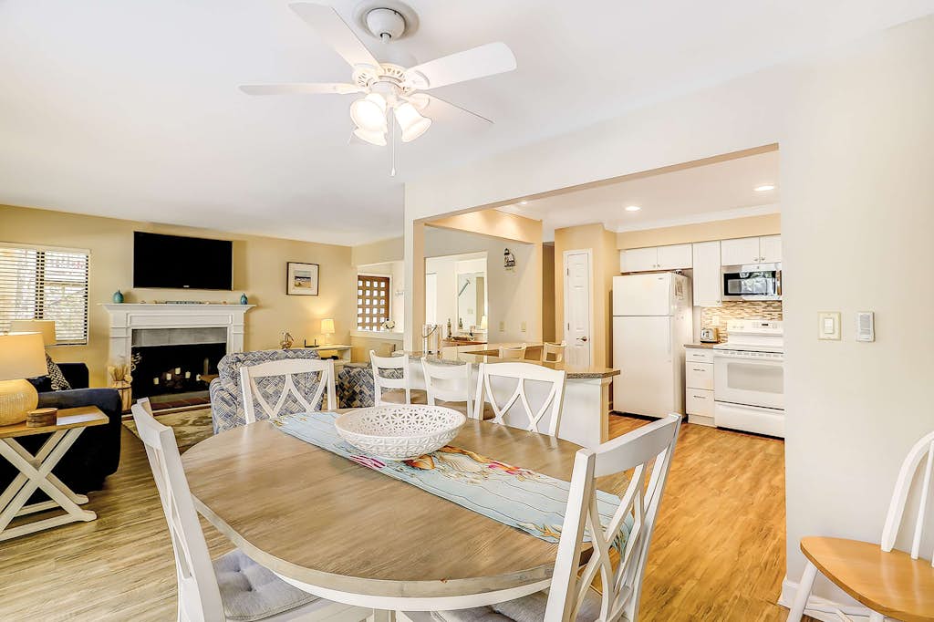Relaxing First-Floor Condo | Walk to Beach | Spacious Deck + Remote Work Setup 