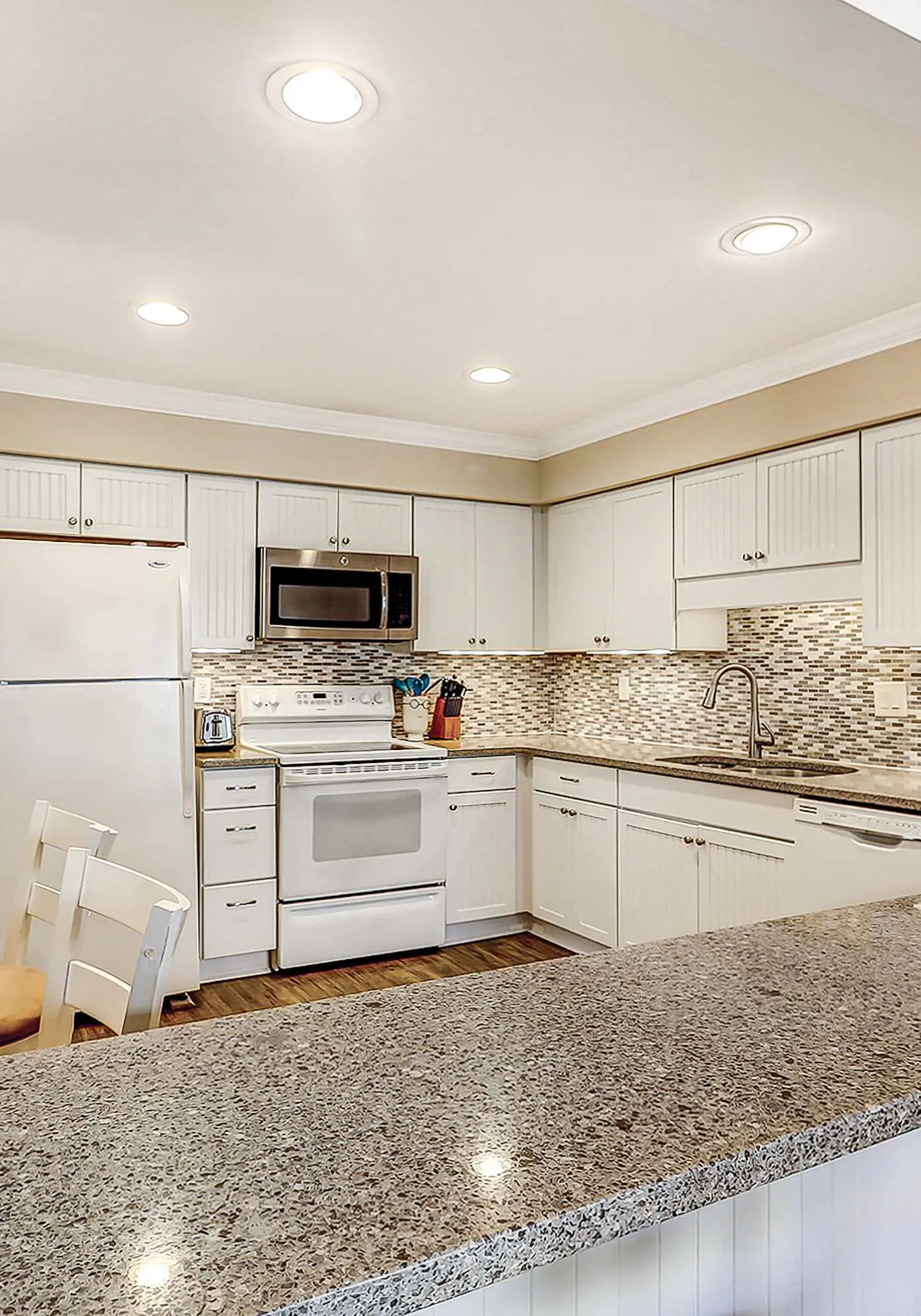 Relaxing First-Floor Condo | Spacious Deck + Remote Work Setup | Walk to Beach