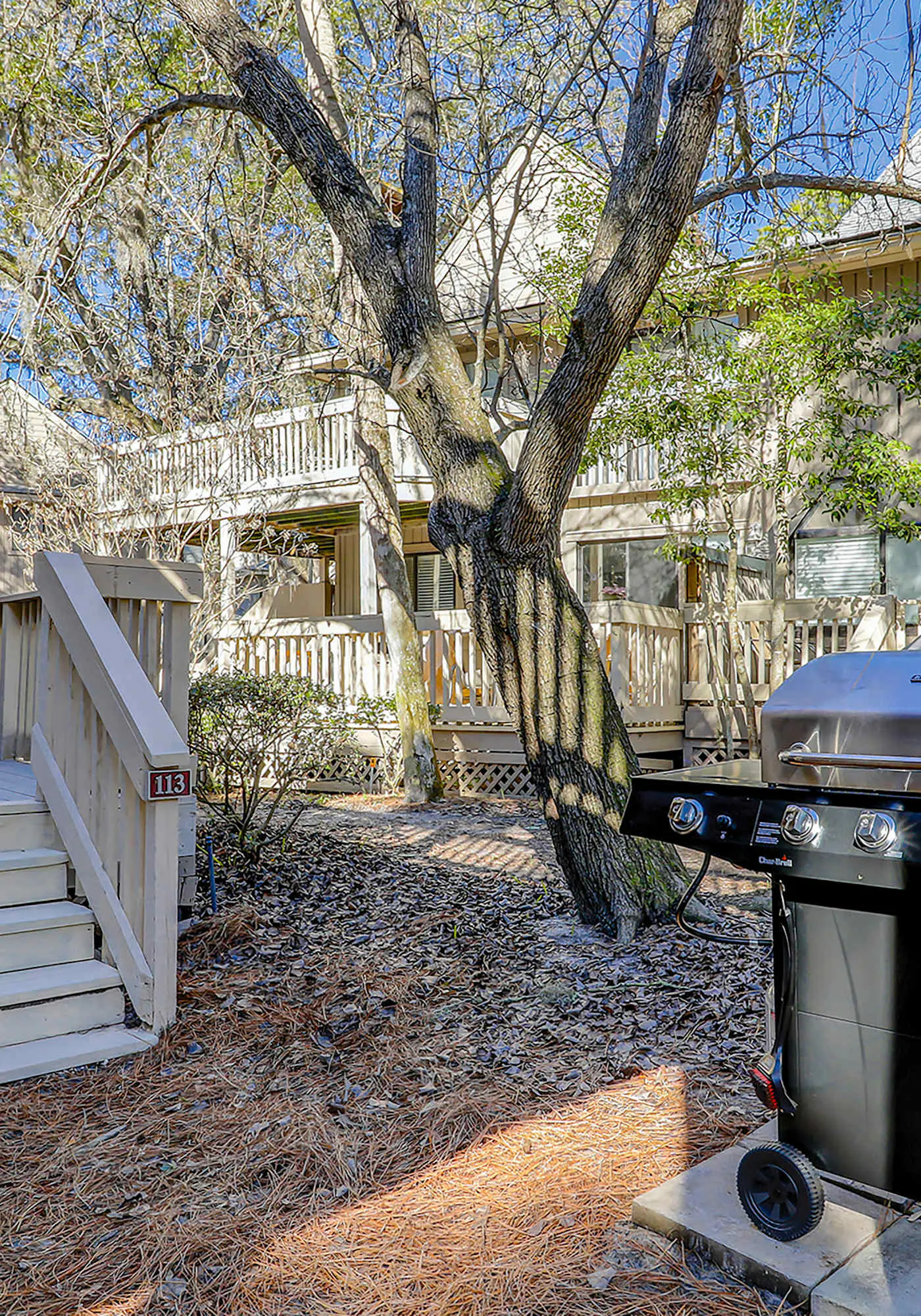 Relaxing First-Floor Condo | Spacious Deck + Remote Work Setup | Walk to Beach