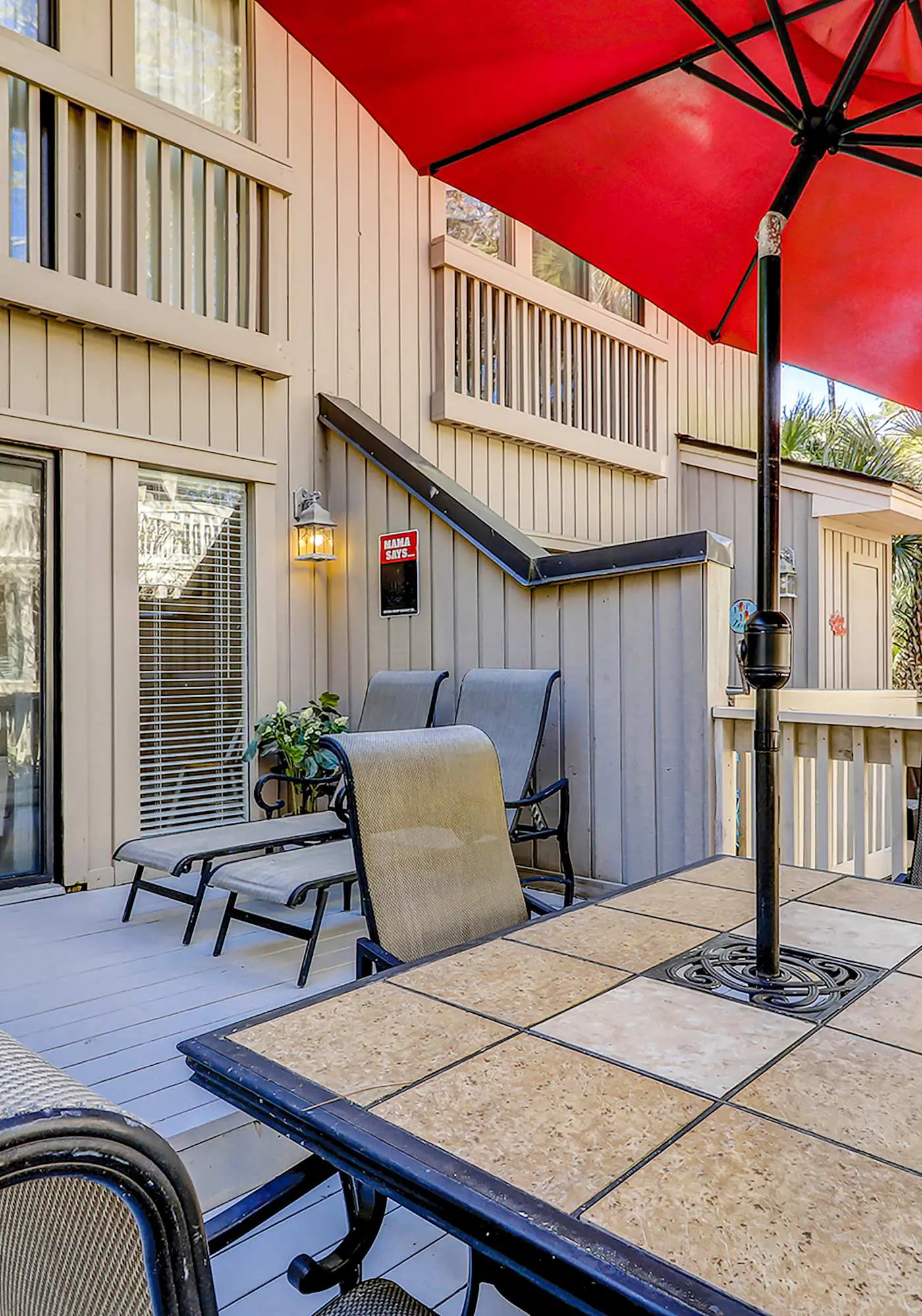 Relaxing First-Floor Condo | Spacious Deck + Remote Work Setup | Walk to Beach