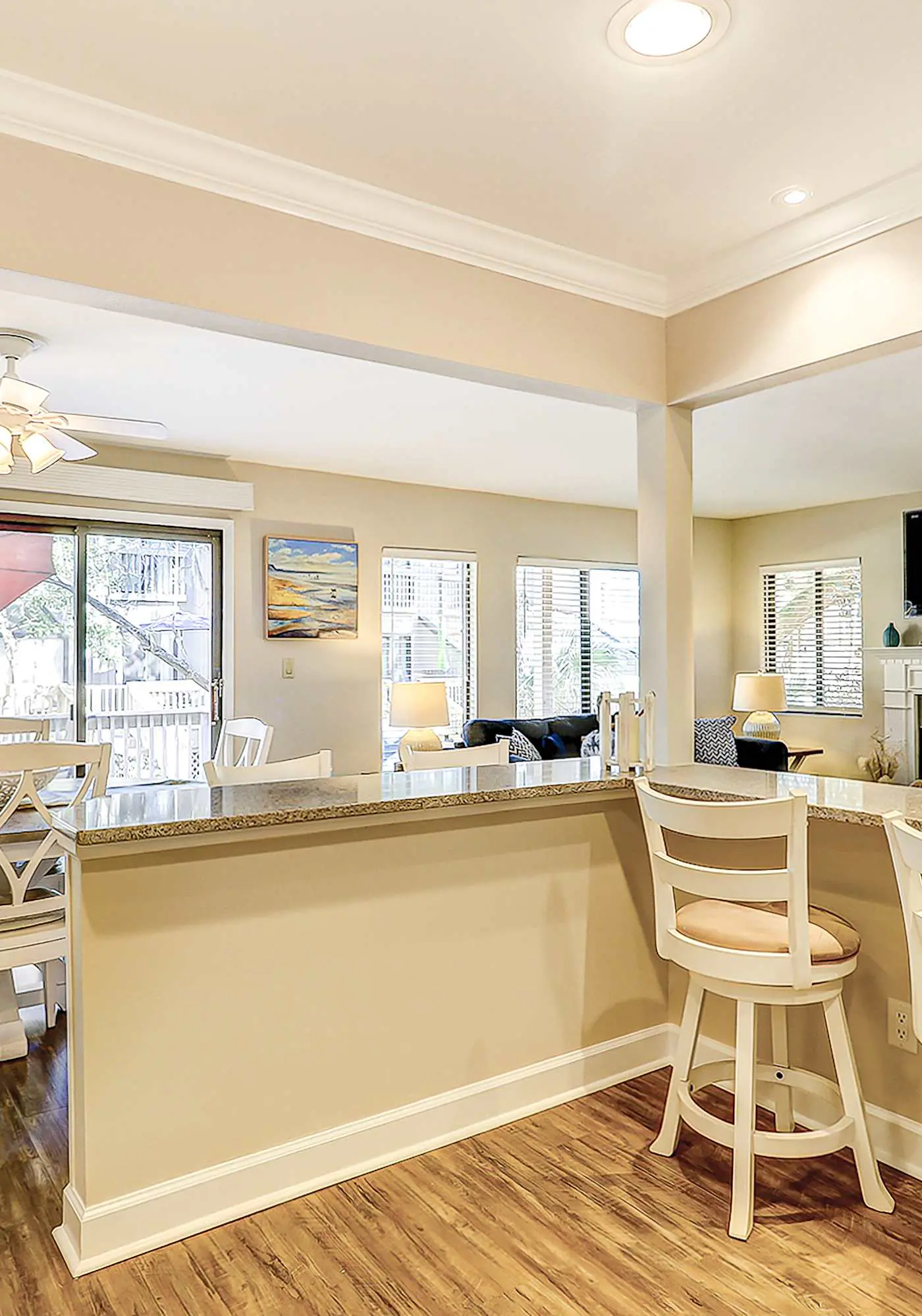 Relaxing First-Floor Condo | Spacious Deck + Remote Work Setup | Walk to Beach