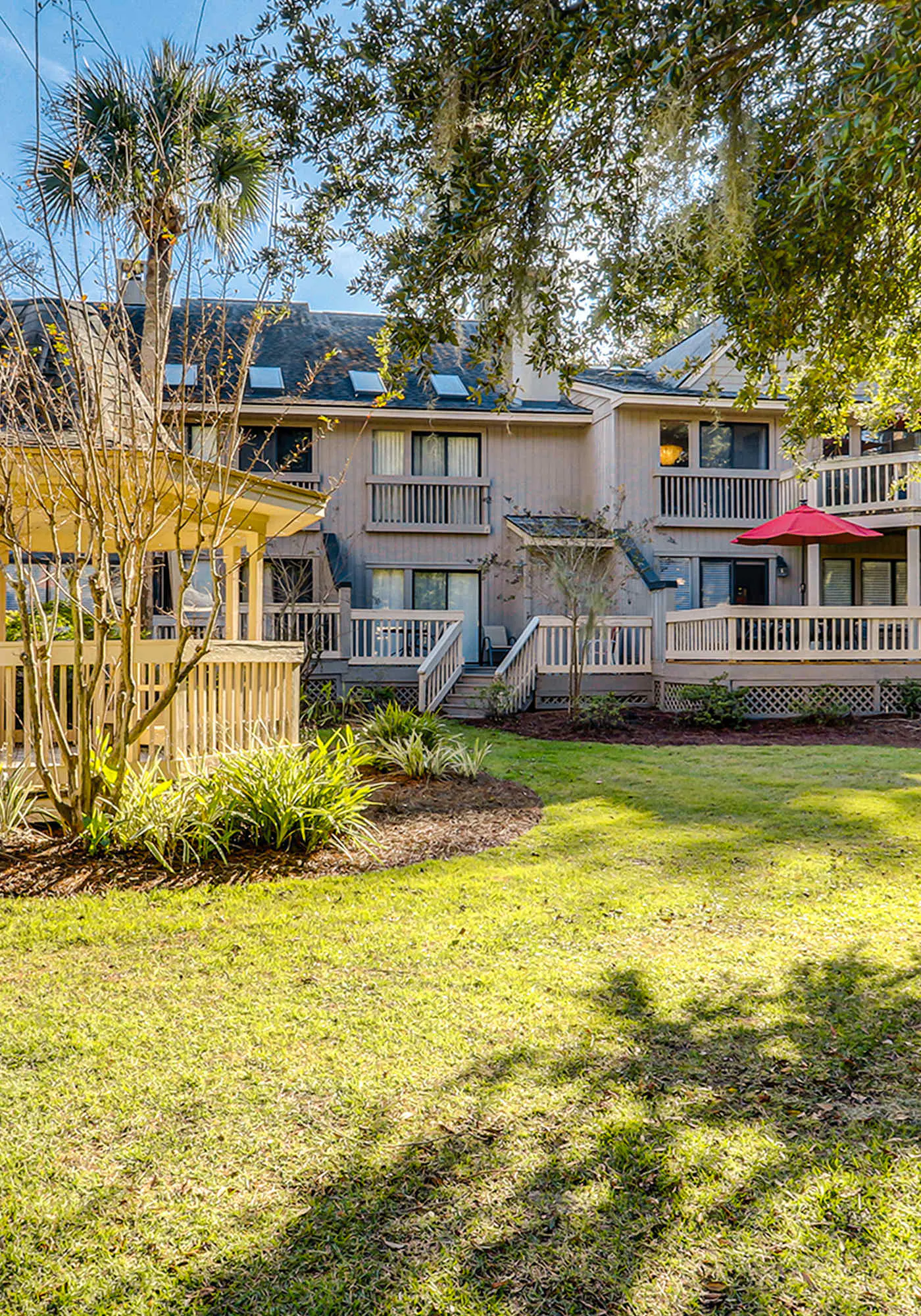 Relaxing First-Floor Condo | Spacious Deck + Remote Work Setup | Walk to Beach