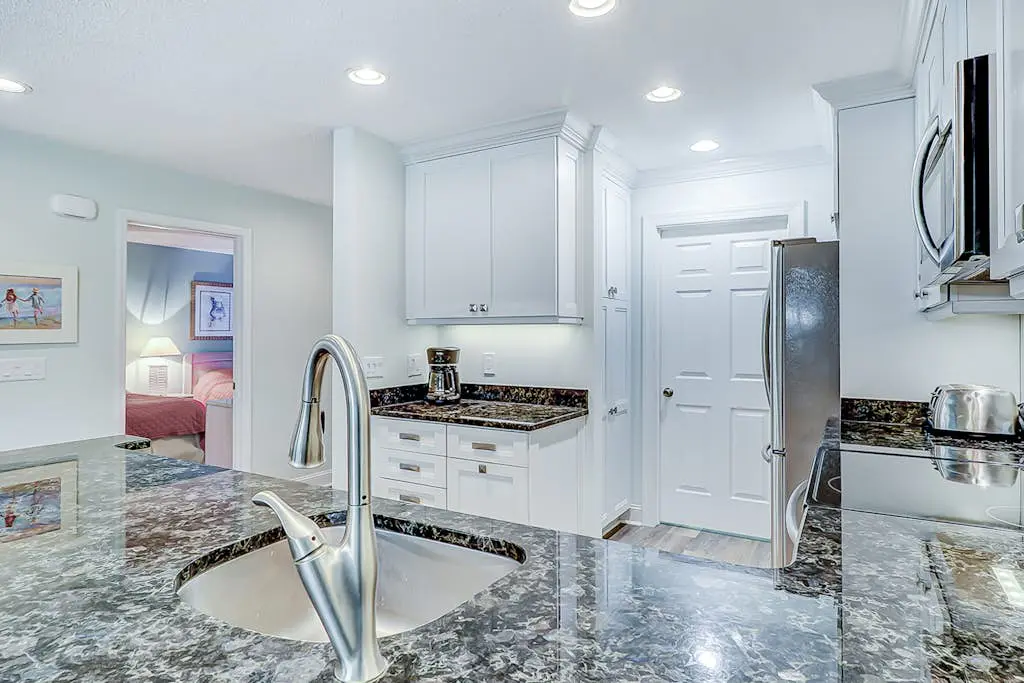 Stylish Villa with Fast WiFi, Shared Pool, & Hot Tub - Mile from the Beach