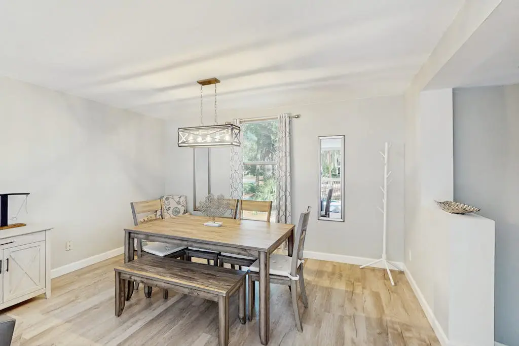 Renovated lagoon view villa with balcony, WiFi, shared pools, & beach access