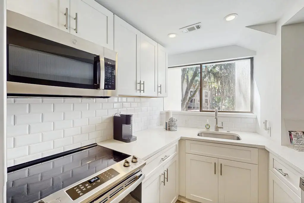 Renovated lagoon view villa with balcony, WiFi, shared pools, & beach access