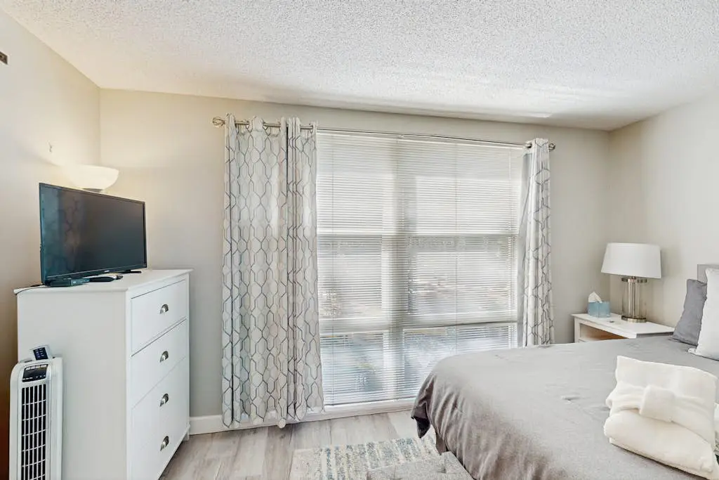 Renovated lagoon view villa with balcony, WiFi, shared pools, & beach access