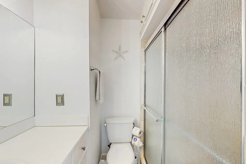 Renovated lagoon view villa with balcony, WiFi, shared pools, & beach access