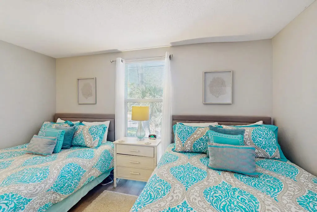 Renovated lagoon view villa with balcony, WiFi, shared pools, & beach access