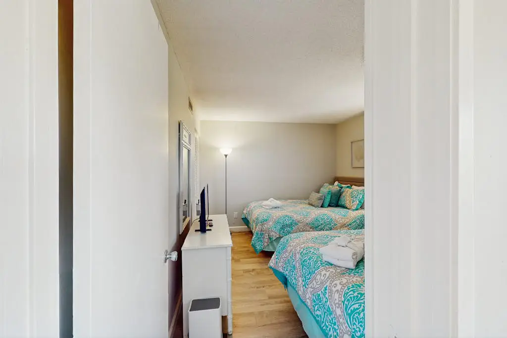 Renovated lagoon view villa with balcony, WiFi, shared pools, & beach access