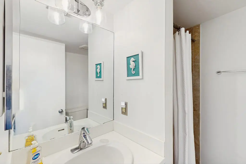 Renovated lagoon view villa with balcony, WiFi, shared pools, & beach access