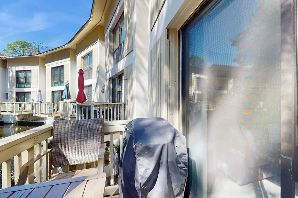 Renovated lagoon view villa with balcony, WiFi, shared pools, & beach access