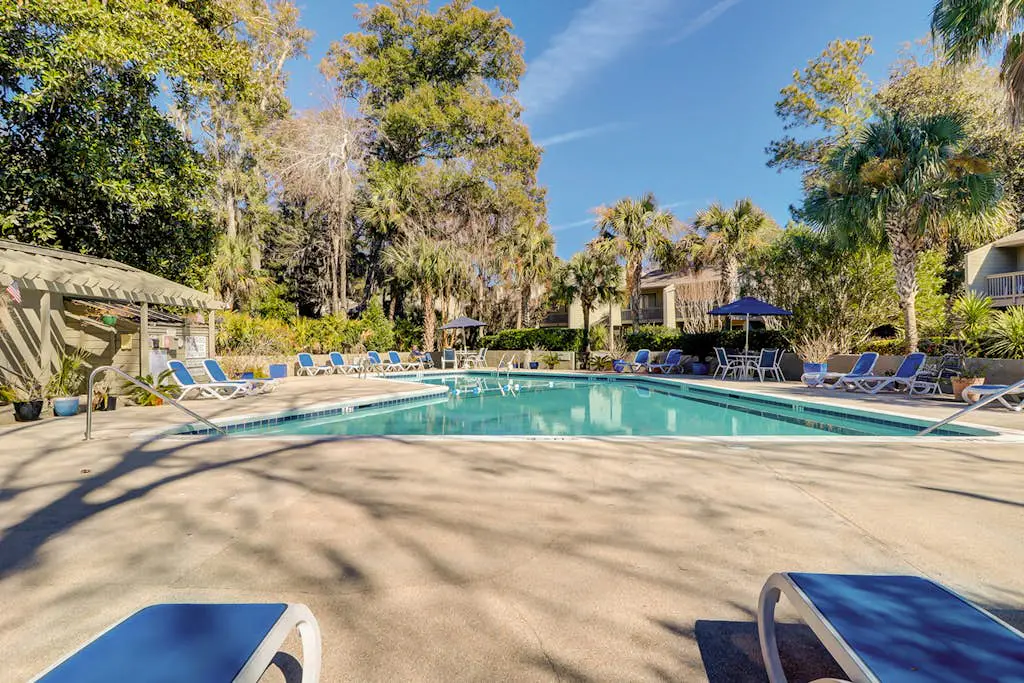     Relaxing Coastal Escape- Golf course view with shared pool, nearby beach access, and serene island charm