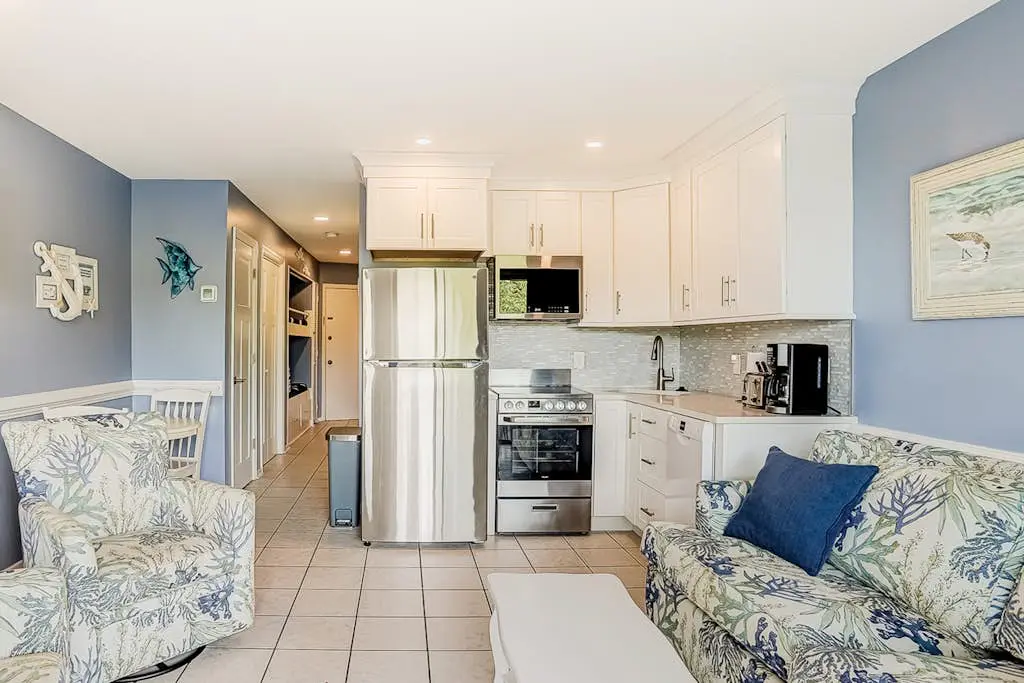 Oceanfront resort condo with WiFi, balcony, pool, grills, & beach access