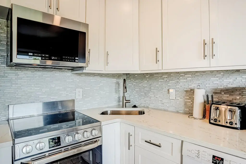Oceanfront resort condo with WiFi, balcony, pool, grills, & beach access