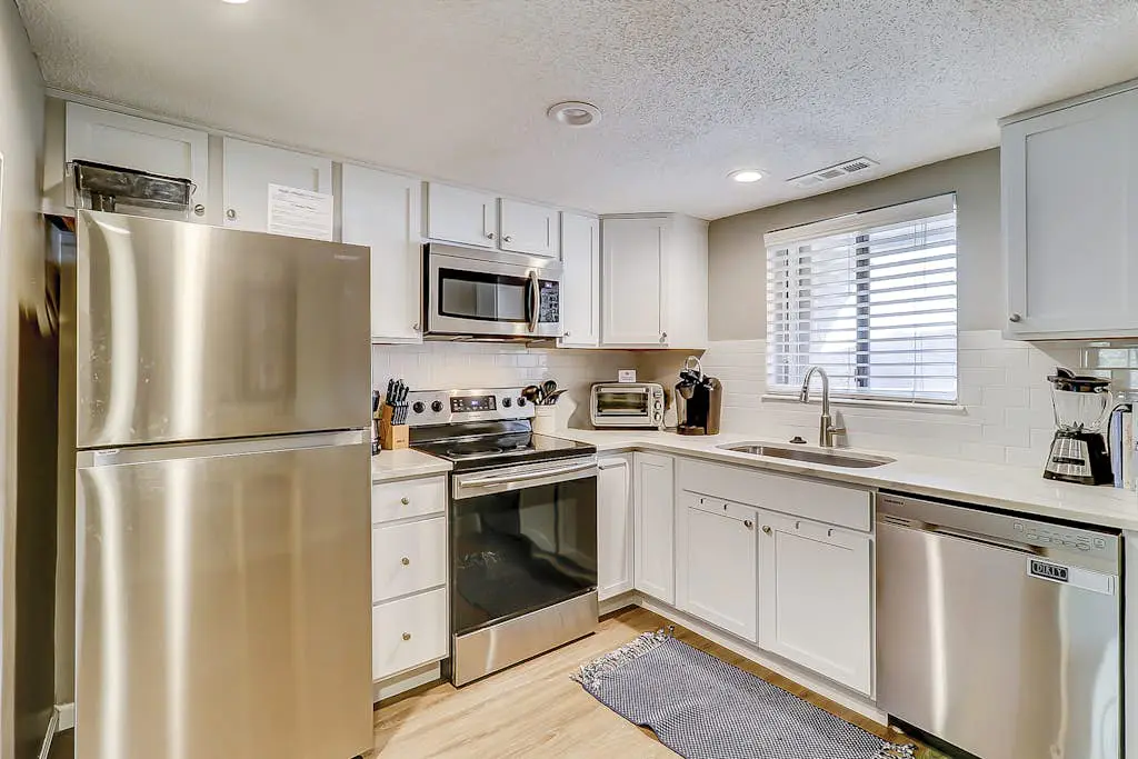 Snowbird/dog-friendly villa with WiFi, 2 patios, & grill + pool/ beach access