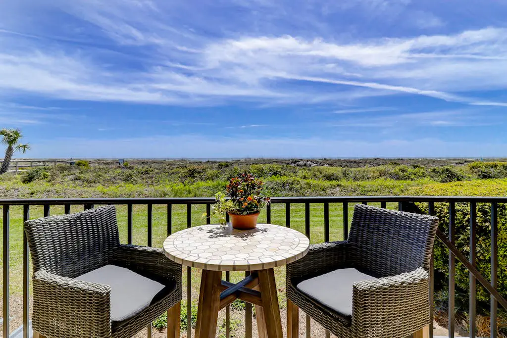 Beachfront escape with pools, hot tub, WiFi, washer dryer, & central AC