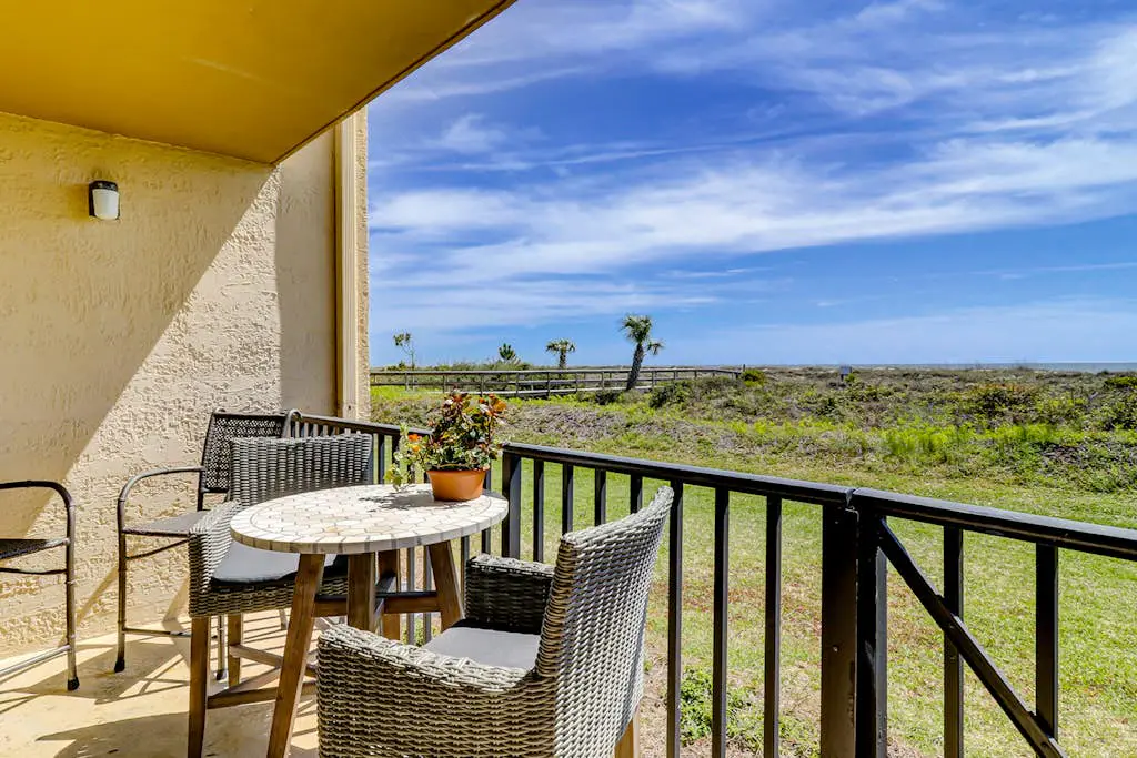 Beachfront escape with pools, hot tub, WiFi, washer dryer, & central AC