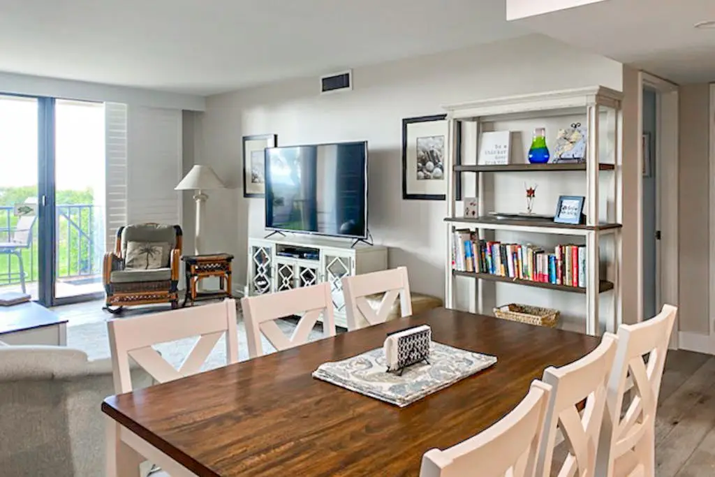 Beachfront escape with pools, hot tub, WiFi, washer dryer, & central AC