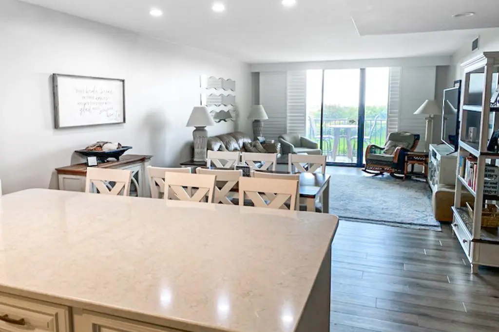 Beachfront escape with pools, hot tub, WiFi, washer dryer, & central AC